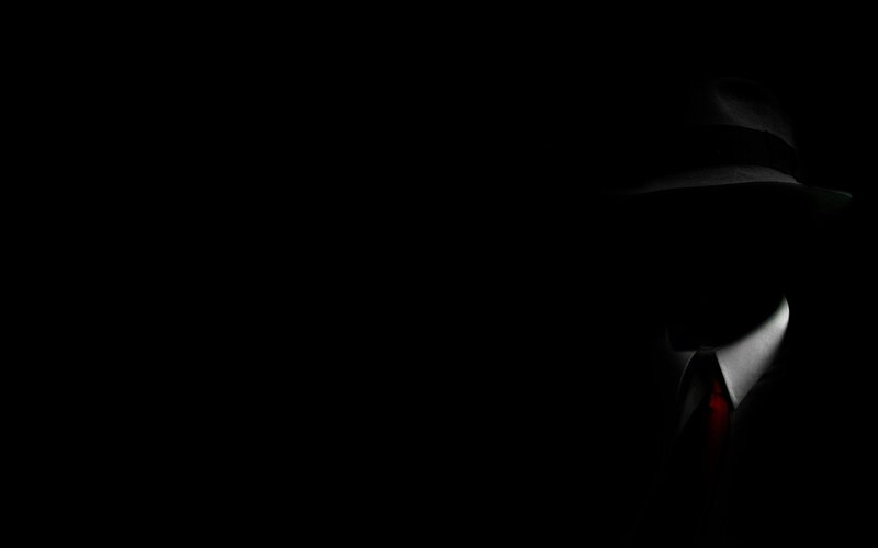 silhouette of a man in hat