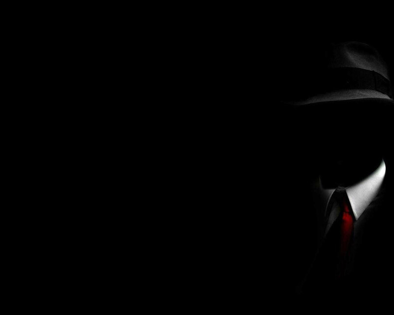 silhouette of a man in hat