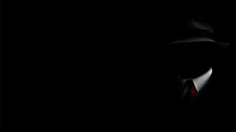 silhouette of a man in hat