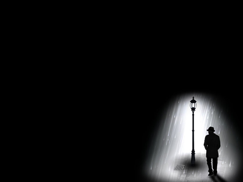 Silhouette of a man in the rain