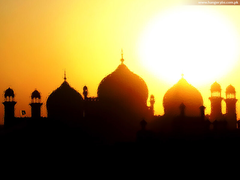 Silhouette of a mosque at sunset