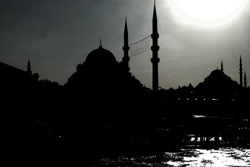 Silhouette of a mosque at sunset