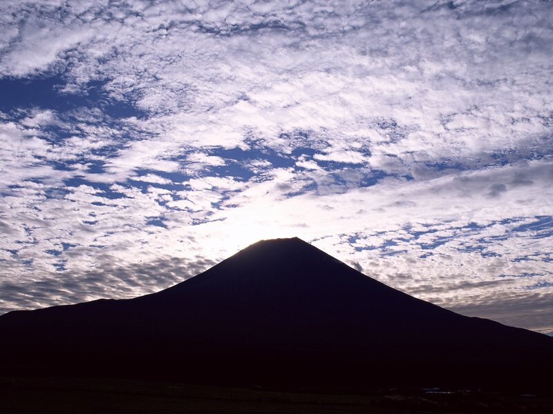 Silhouette of a mountain at sunrise
