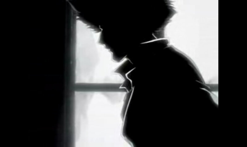 silhouette of a person by window