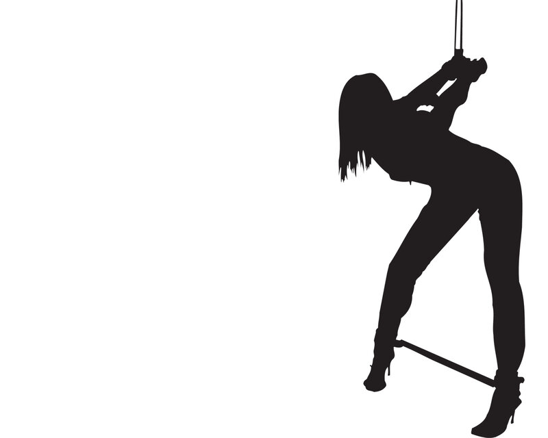 silhouette of a person climbing