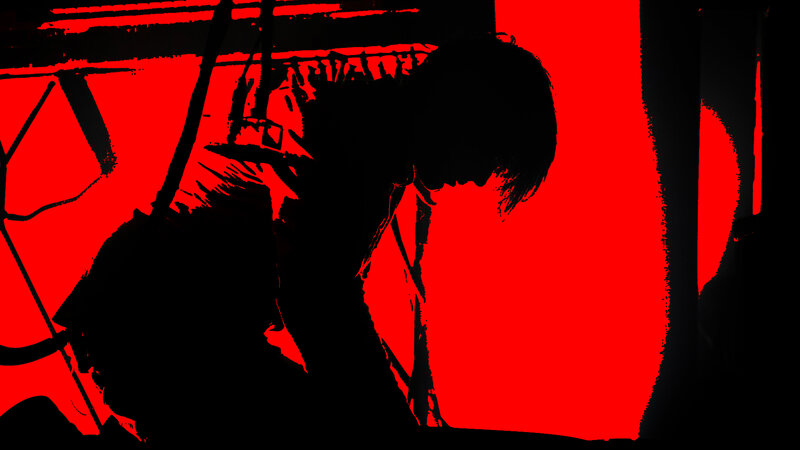 silhouette of a person in red