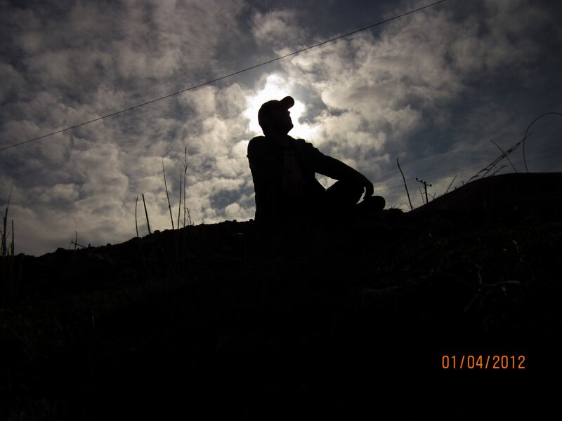 Silhouette of a person sitting