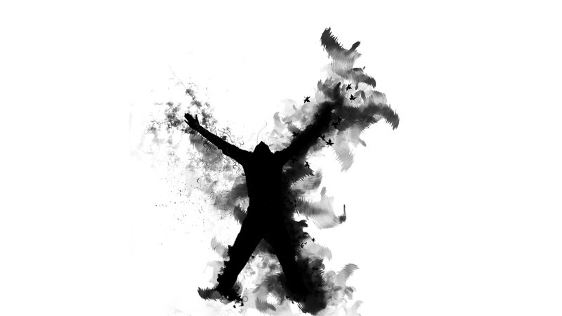 silhouette of a person with arms raised