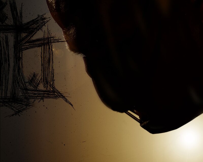 silhouette of a person with graffiti