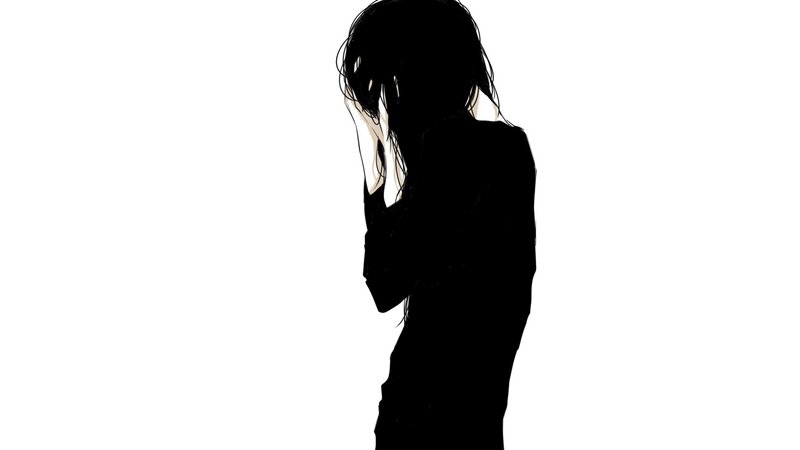 silhouette of a person with long hair