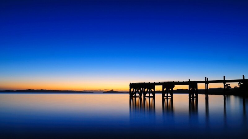 Silhouette of a Pier — Blue, Serene, Sunset, Photograph