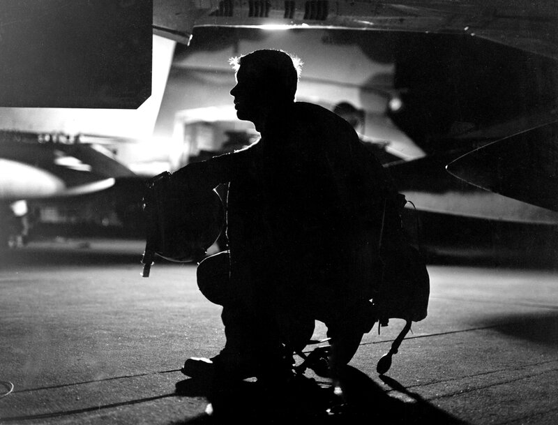 Silhouette of a pilot with aircraft