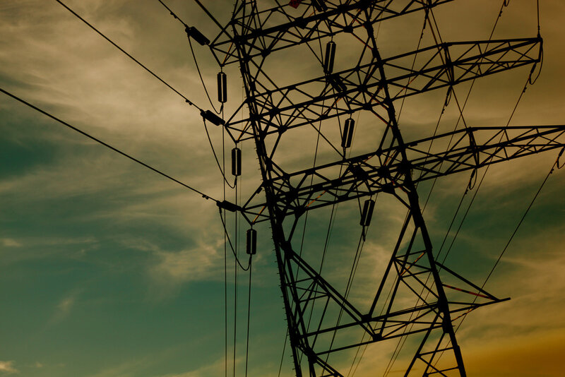 Silhouette of a power line tower