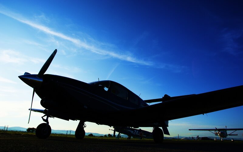 Silhouette of a propeller plane