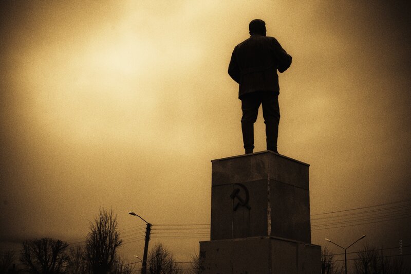Silhouette of a statue at dusk