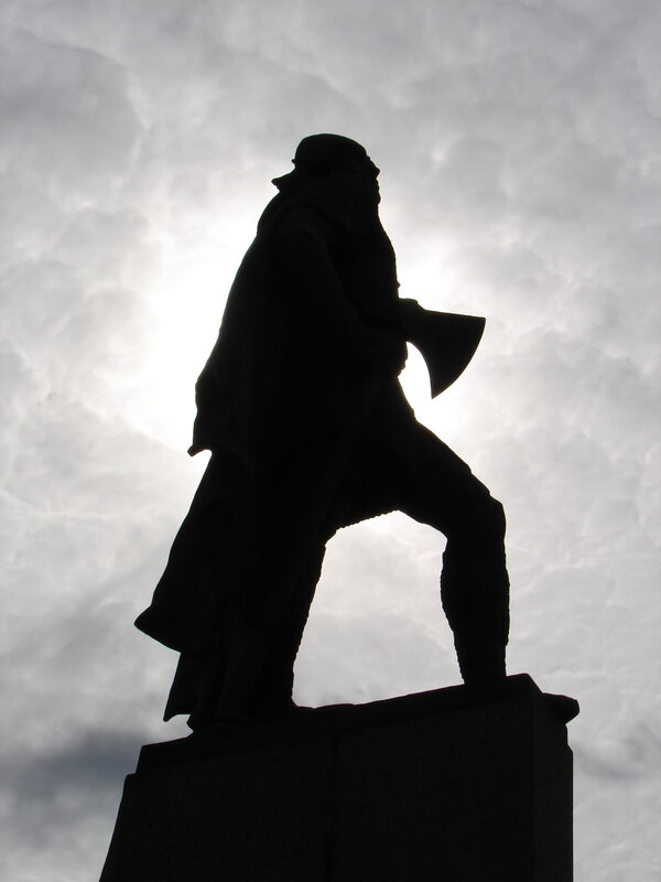 silhouette of a statue