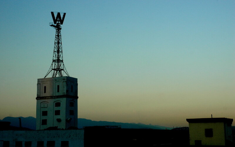 silhouette of a tower at dusk