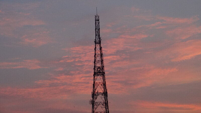 Silhouette of a Transmission Tower — Pink