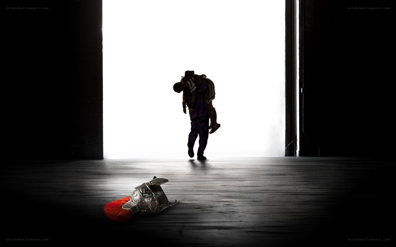 Silhouette of a warrior carrying another