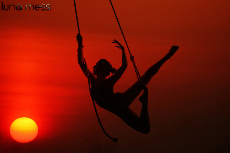 Silhouette of Aerialist — Red