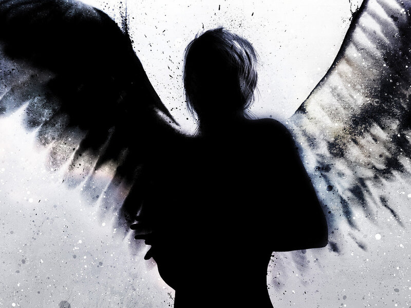 silhouette of angel with wings