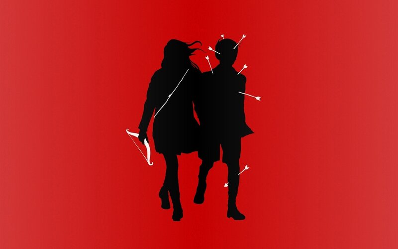silhouette of archer couple