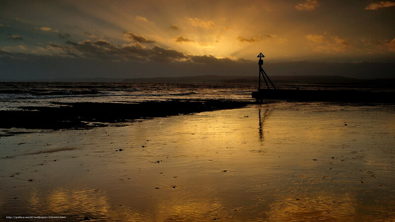 Silhouette of Beacon on Beach