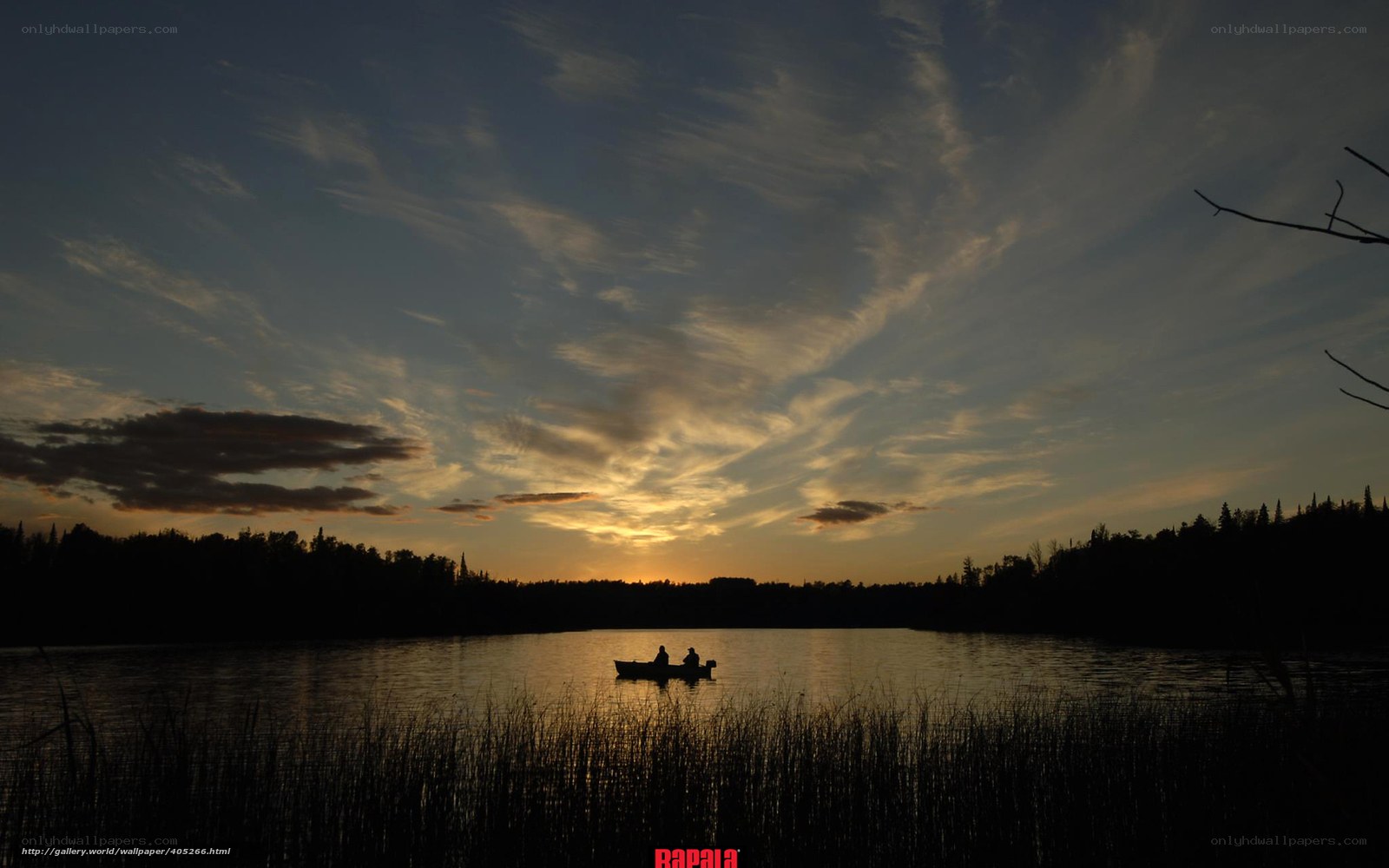 Silhouette of boat at sunset