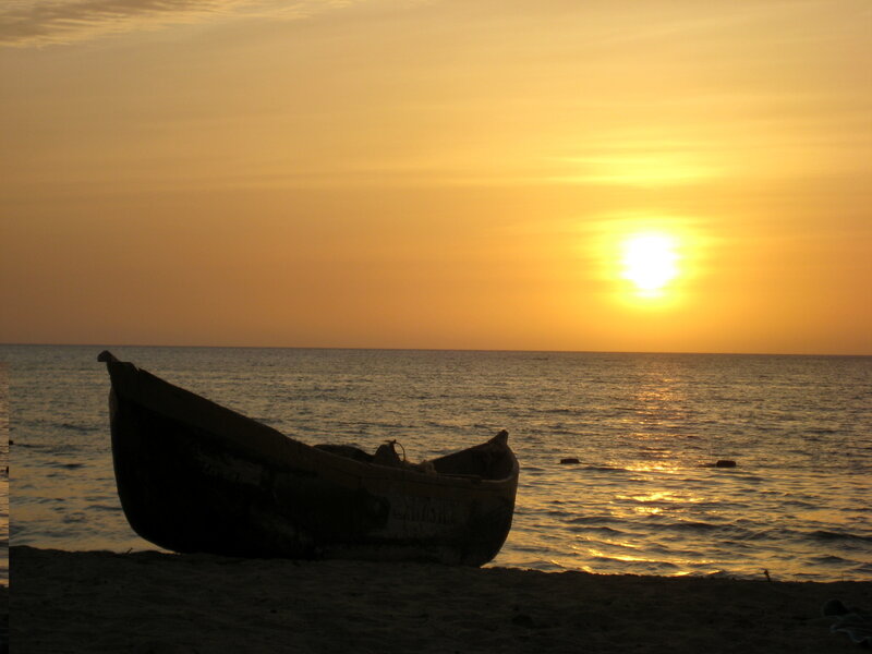 Silhouette of Boat on Beach