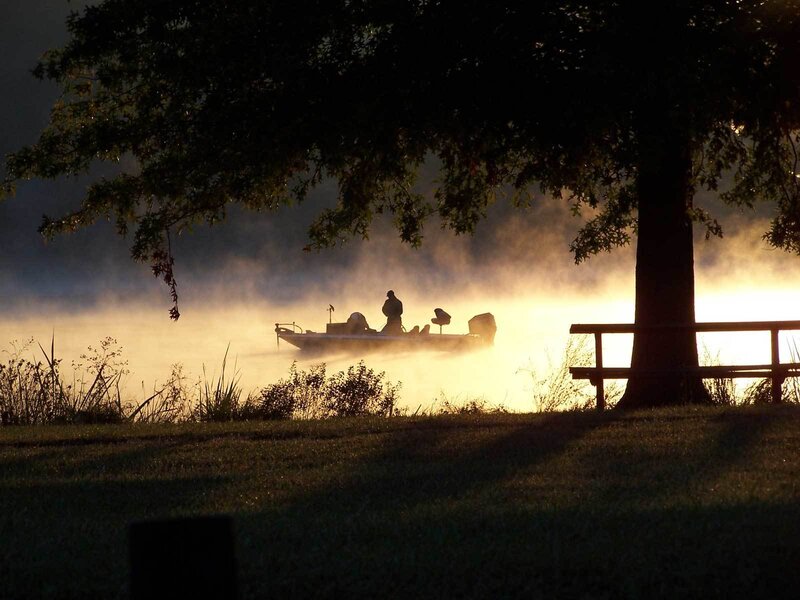 Silhouette of Boat on Lake