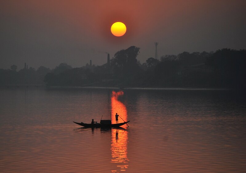Silhouette of Boat on River