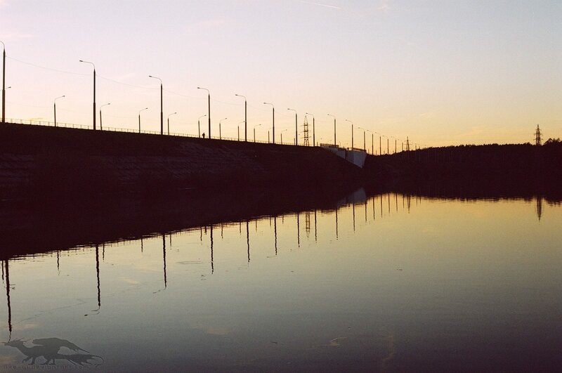 Silhouette of bridge at sunset