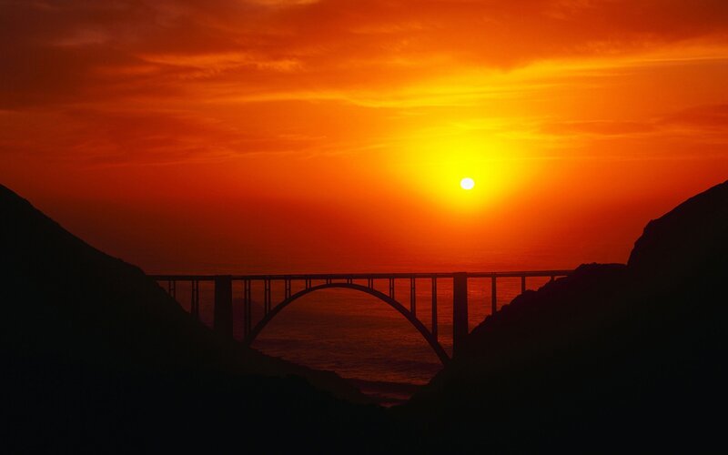 Silhouette of Bridge at Sunset — Orange, Dramatic, Photograph, Sun, Mountains, Red