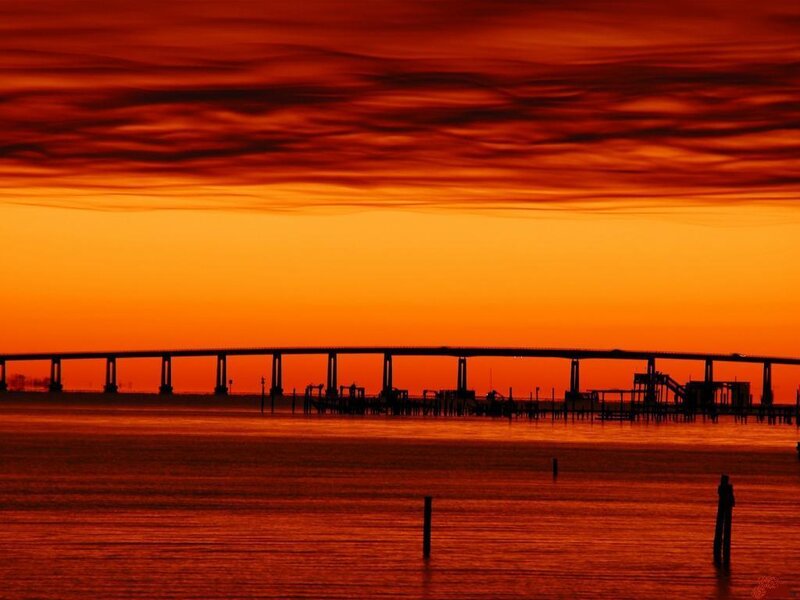 Silhouette of Bridge at Sunset — Orange, Dramatic, Photograph