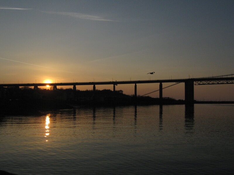 Silhouette of Bridge at Sunset — Orange, Serene, Photograph, Sun