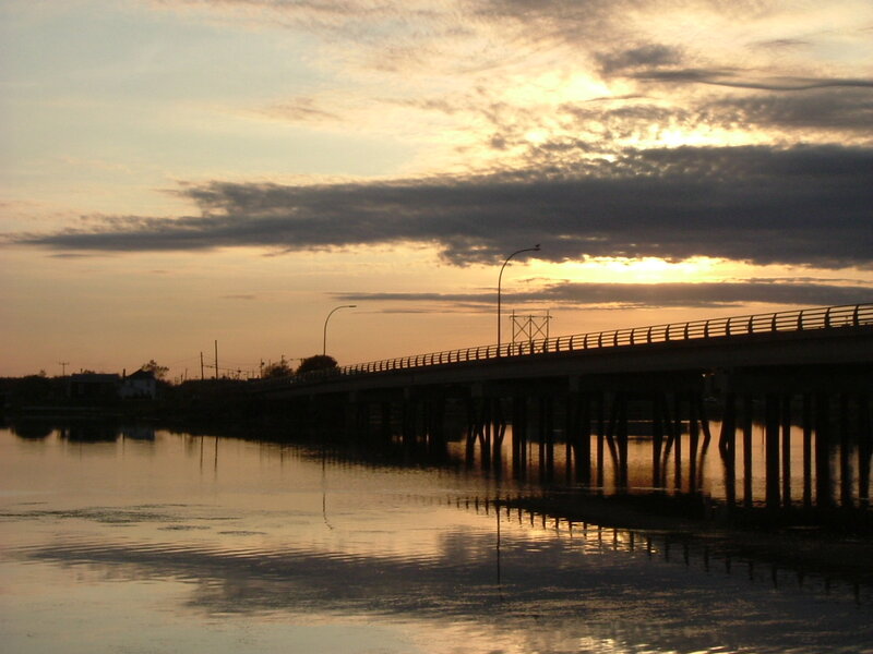 Silhouette of Bridge at Sunset — Orange, Serene, Photograph