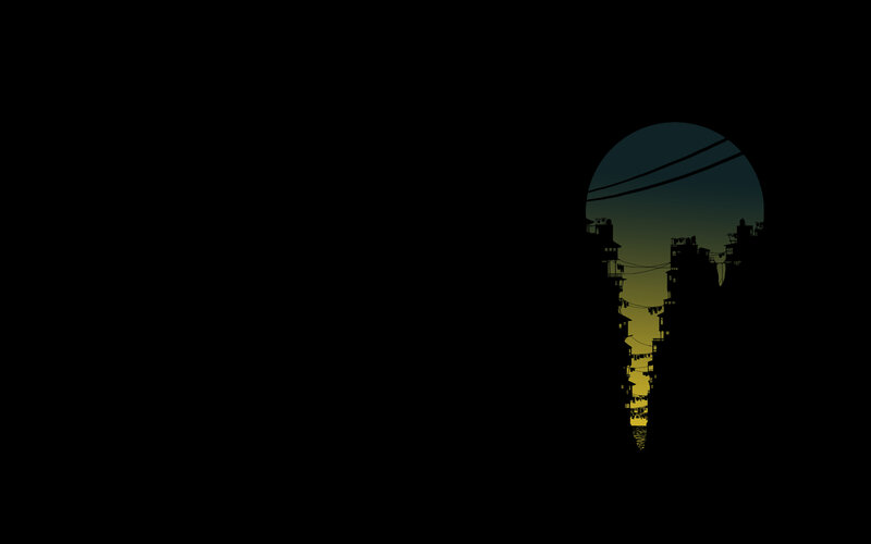 silhouette of buildings at dusk
