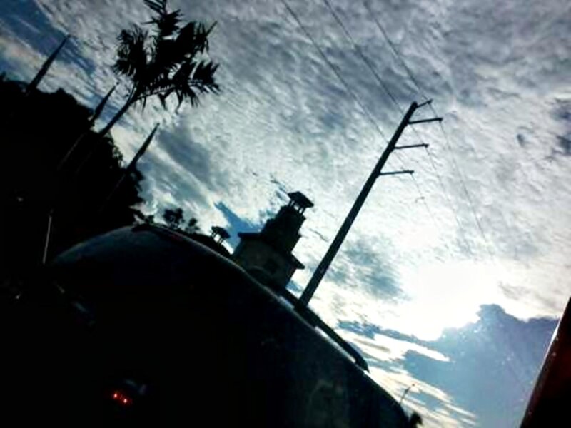 Silhouette of Car and Pole