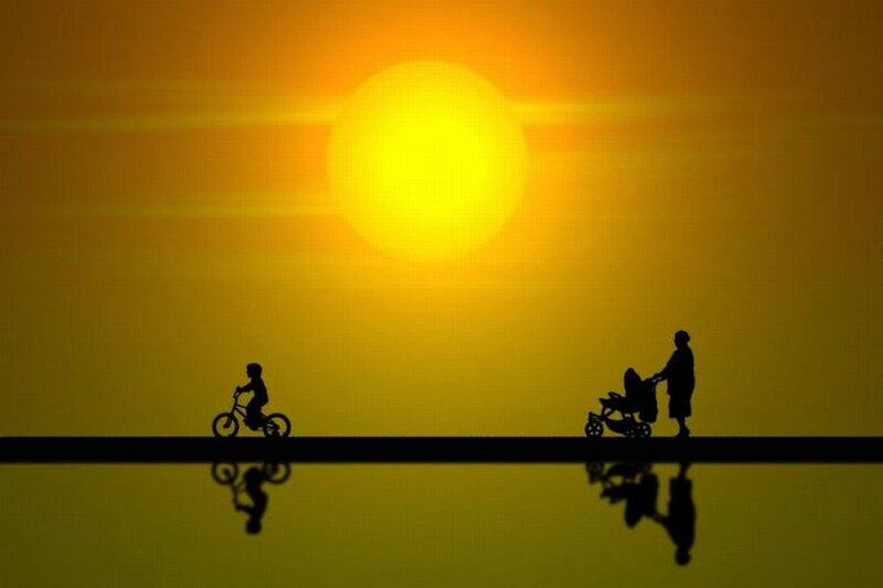 Silhouette of Child and Adult
