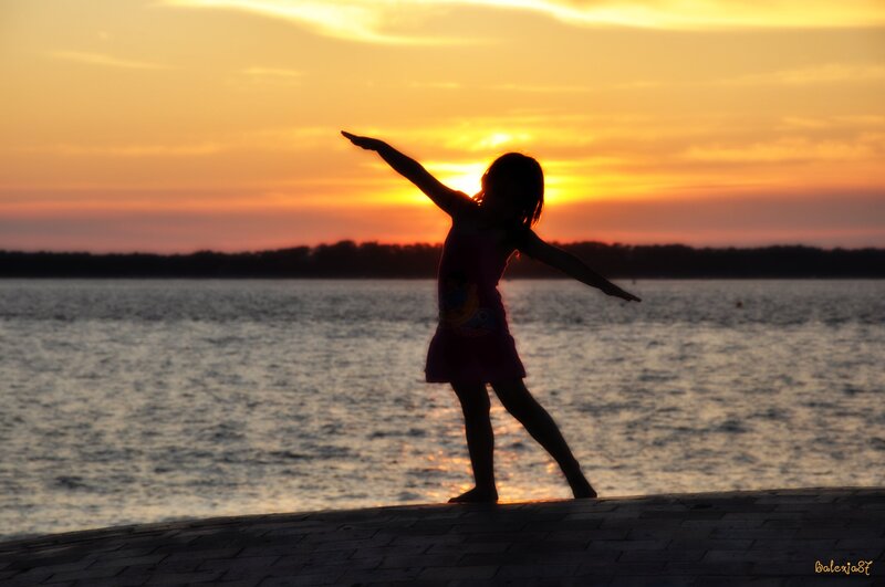 Silhouette of Child Dancing