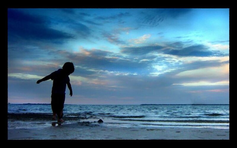 Silhouette of Child on Beach