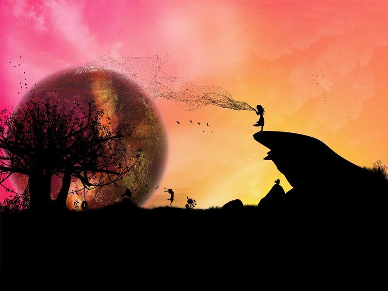 Silhouette of child on cliff