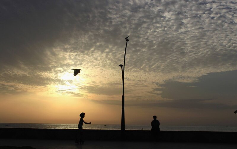 Silhouette of Child on Skateboard