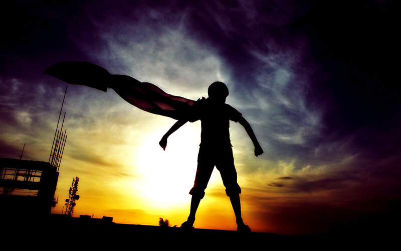 Silhouette of Child with Cape