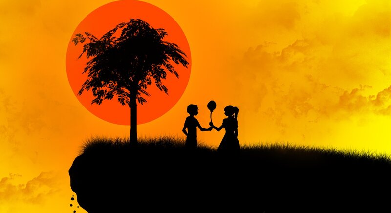 Silhouette of children at sunset