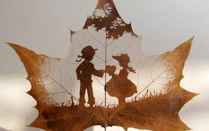 Silhouette of Children on Leaf — Brown