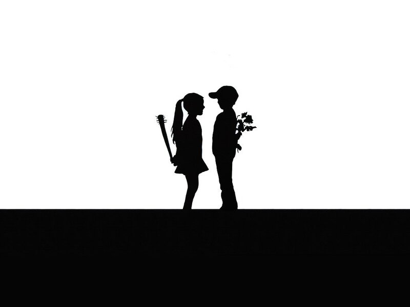 Silhouette of children with flowers and bat