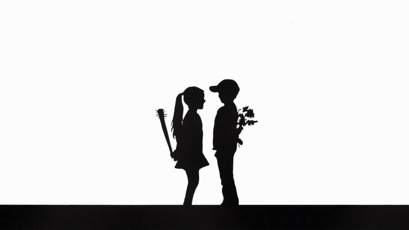 Silhouette of children with flowers and bat