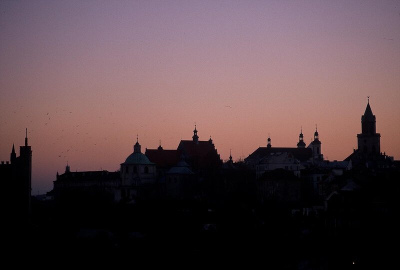 silhouette of city at dusk