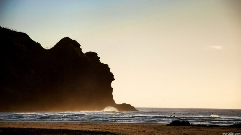 silhouette of cliff at sunset